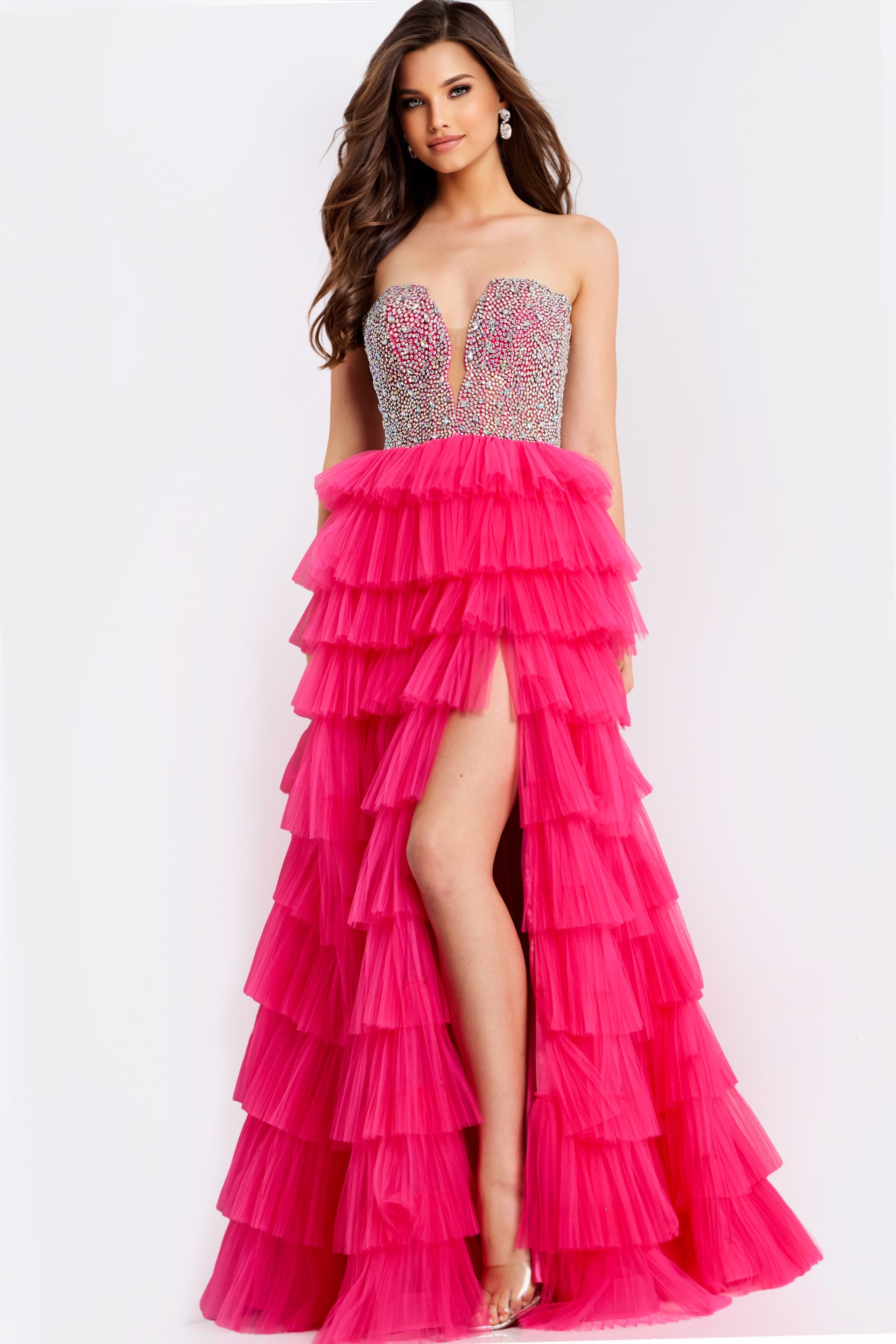 Strapless pink prom gown featuring layered ruffle skirt