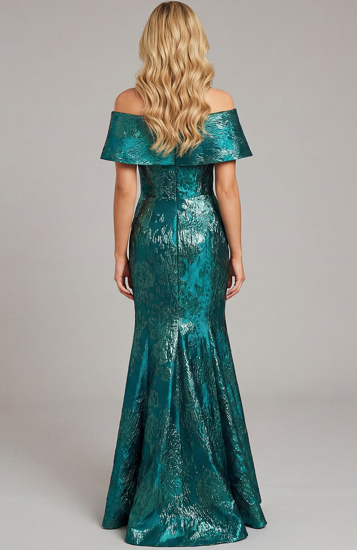 Floor length fitted gown with clean back and smooth flared hem