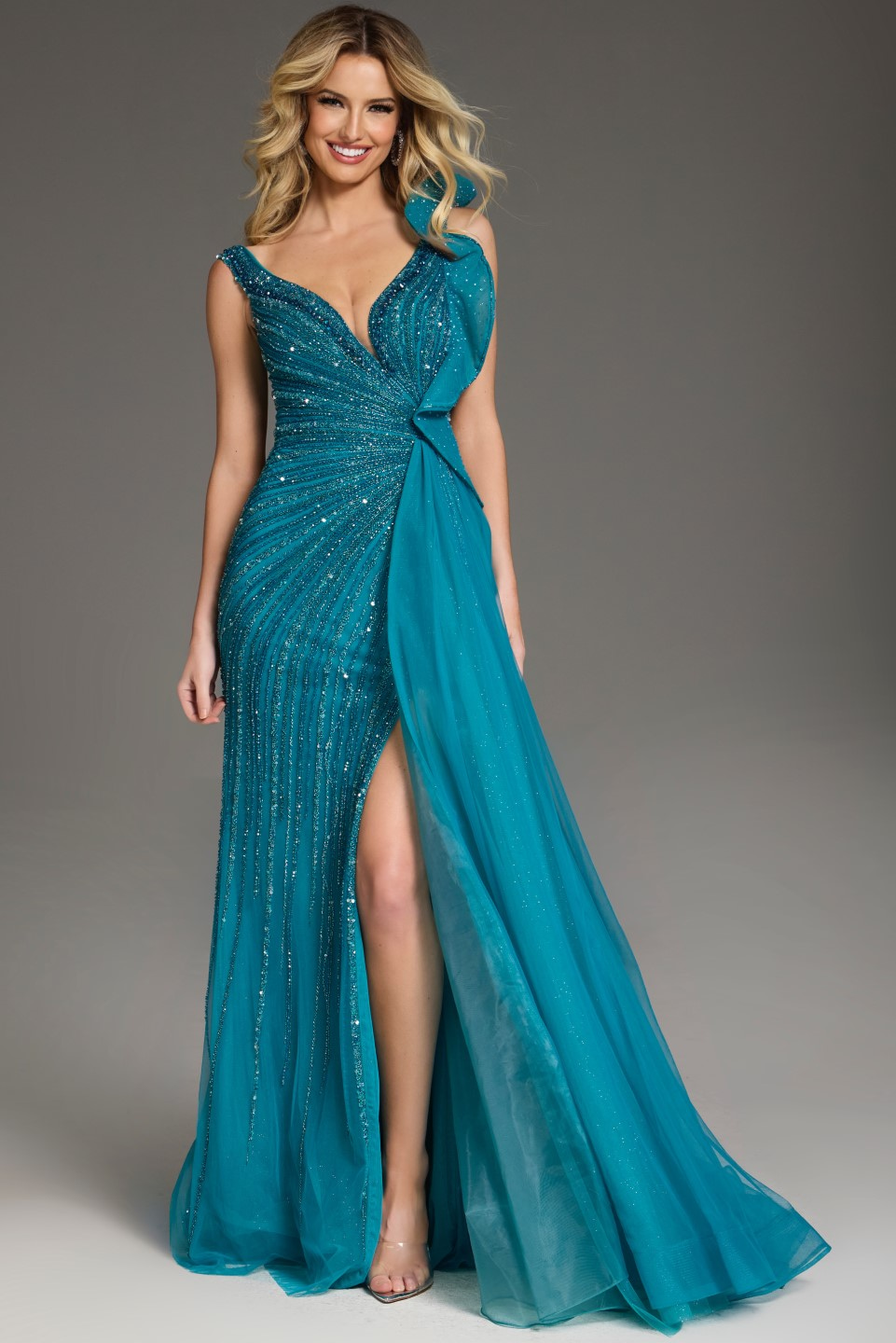 Model wearing Jovani 44846 full-length blue gown with V-neckline and high slit