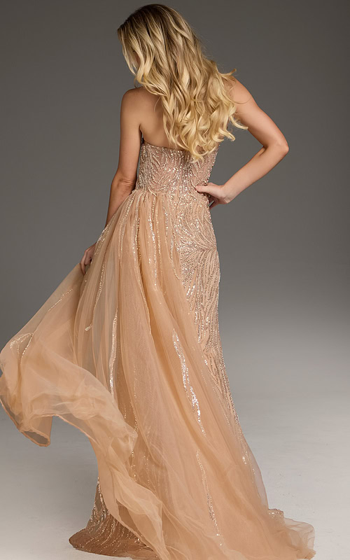 Back view of Jovani 45071 beige gown with flowing skirt