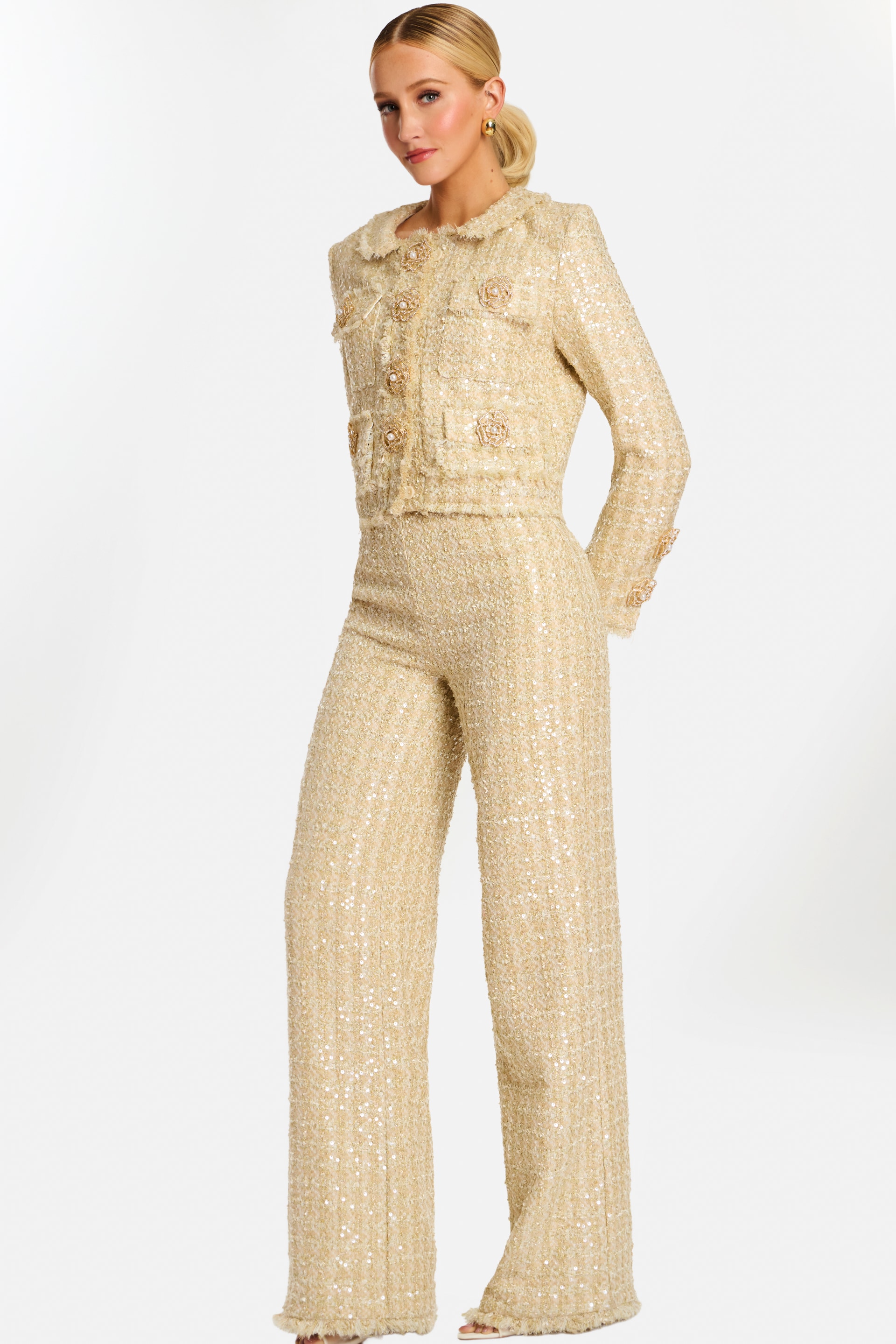 Front view of champagne tweed sequin pantsuit with pearl-embellished jacket