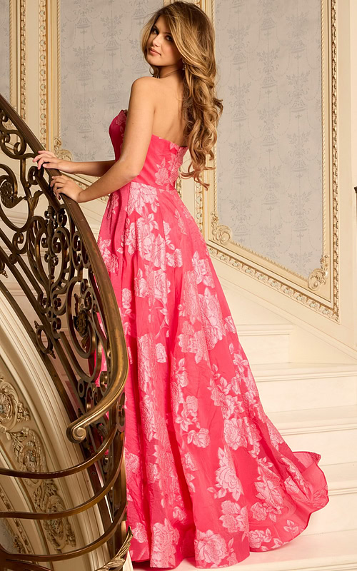 Back View Of Embroidered Strapless Gown With Flowing Skirt
