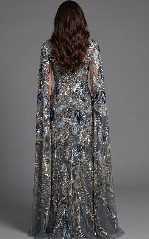 Back view of fitted sequin gown with flowing sheer cape detail