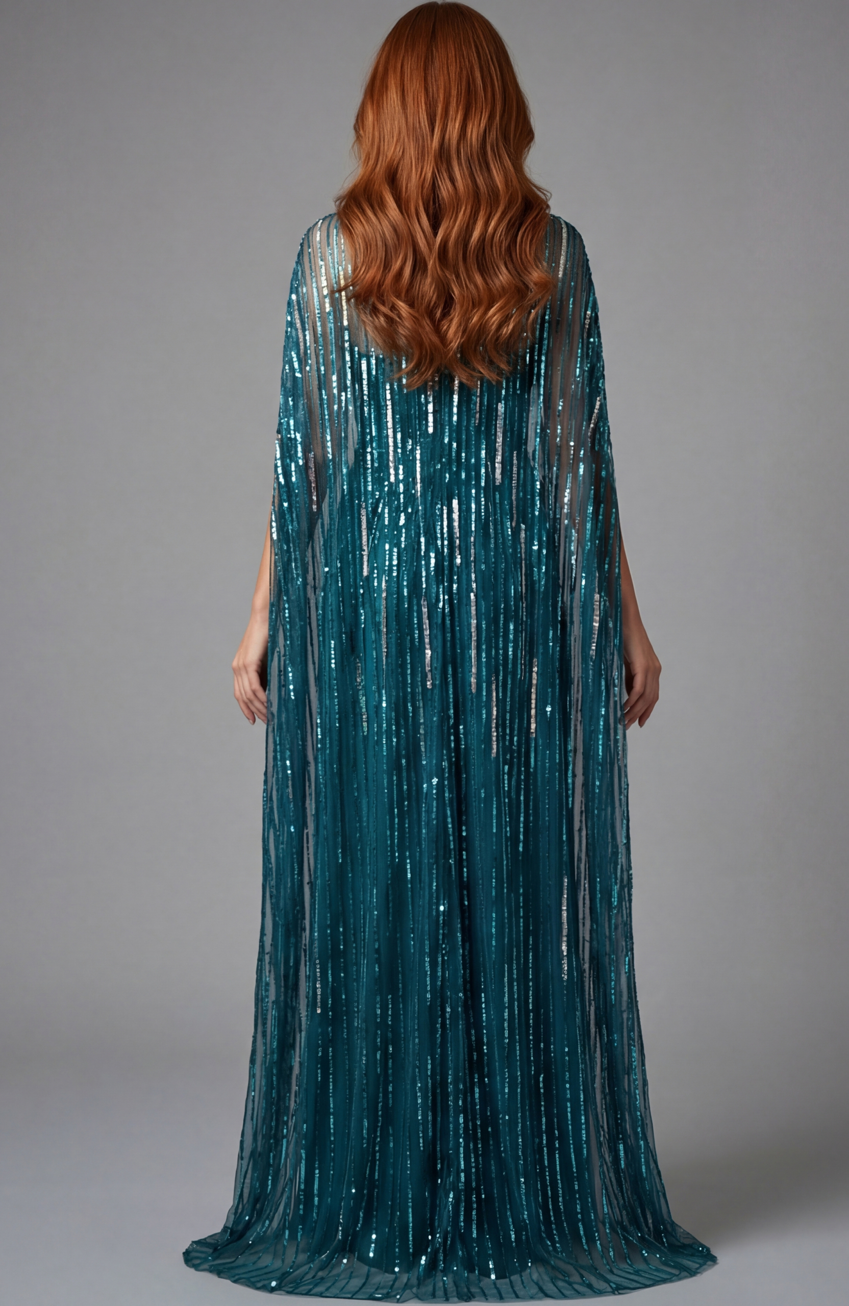 Fitted gown featuring vertical sequin lines and elegant drape