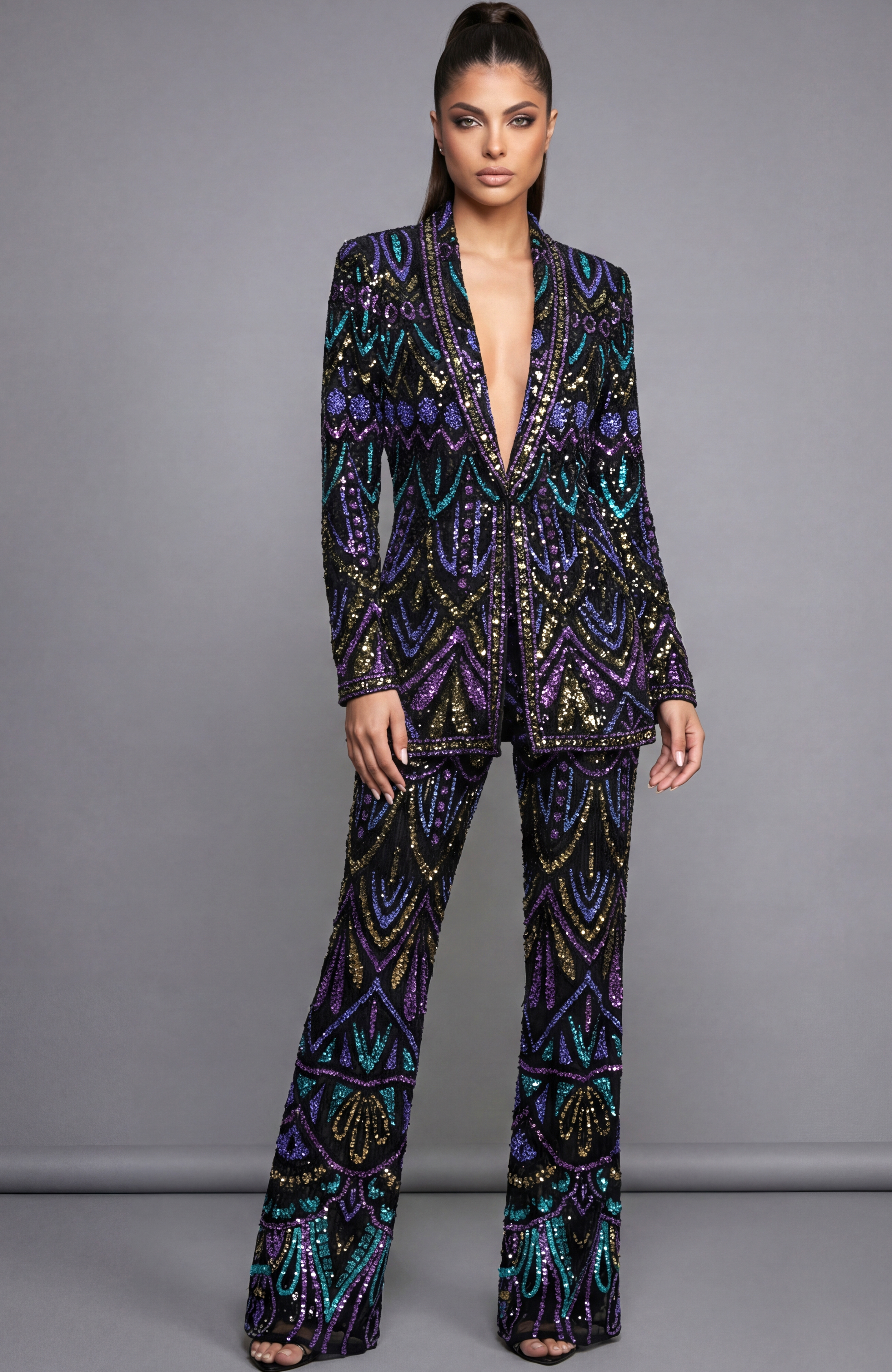 Beaded statement suit with deep V jacket and wide leg embellished pants