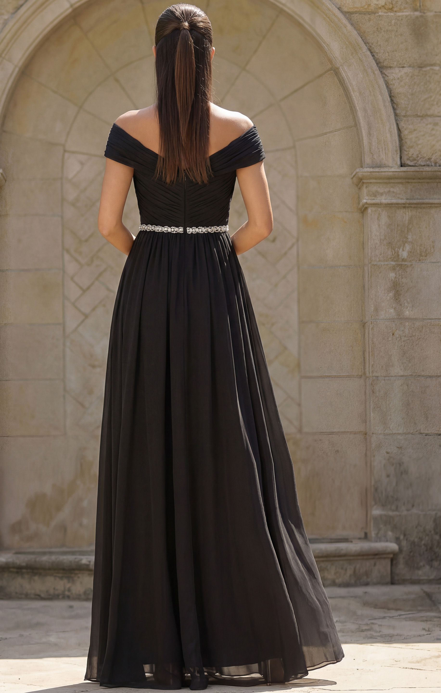 Elegant chiffon dress with soft pleating, off shoulder bodice, and crystal accent trim