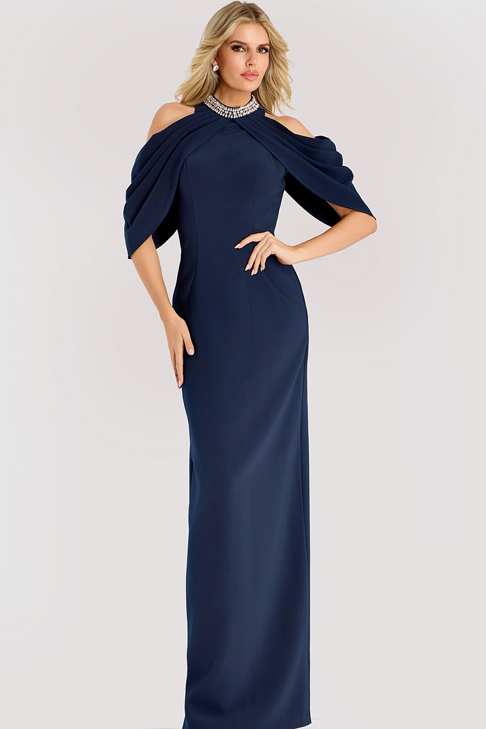 Navy cold shoulder gown with draped cape sleeves and a beaded neckline, tailored in a sleek column silhouette for a refined formal look.