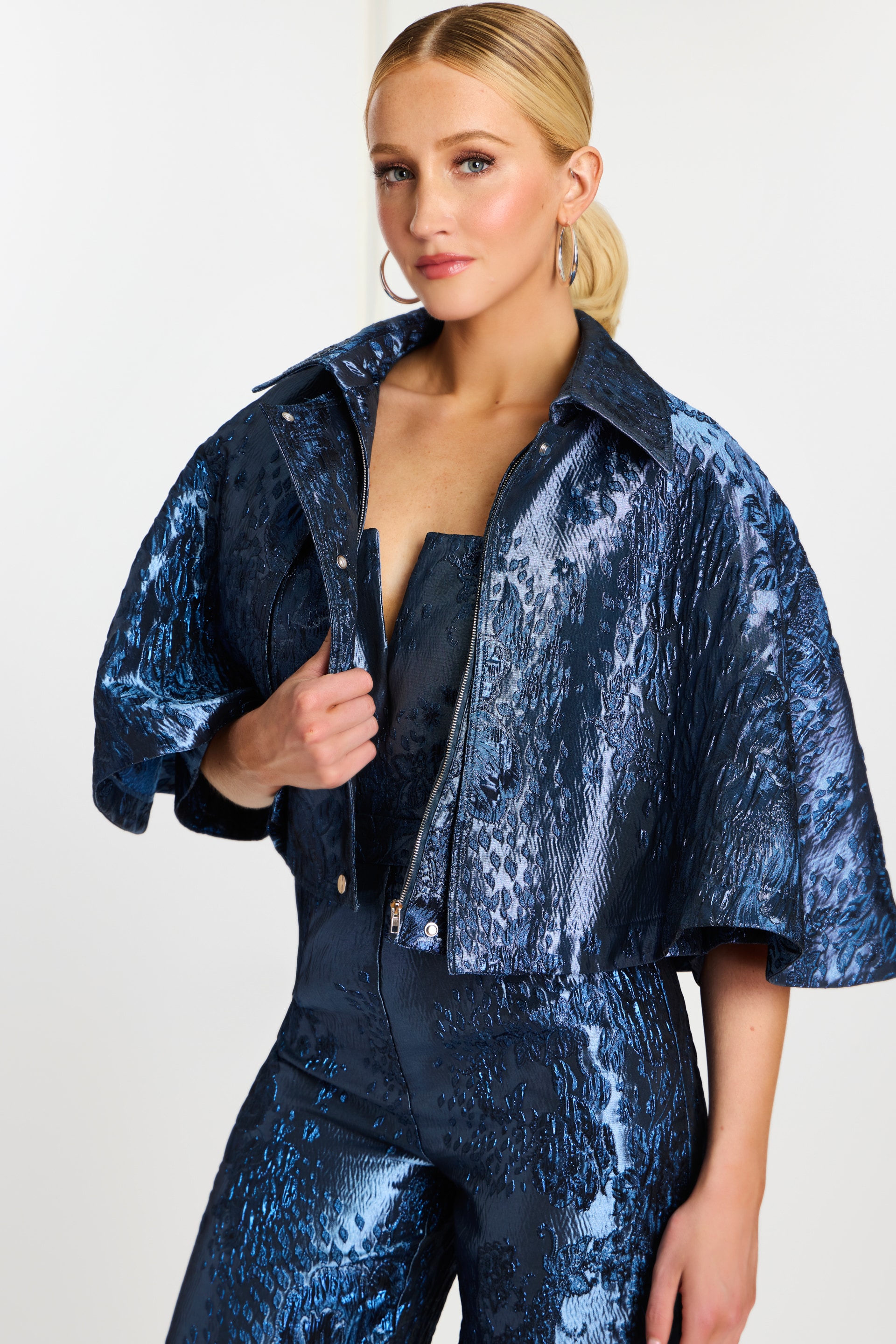 model wearing two piece jumpsuit with matching cape 46782