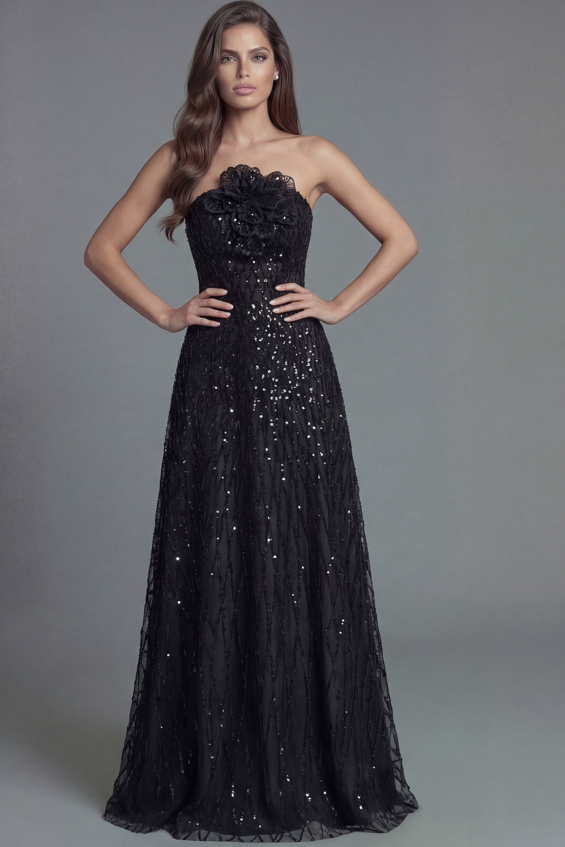 Strapless formal gown with floral detail and flowing skirt