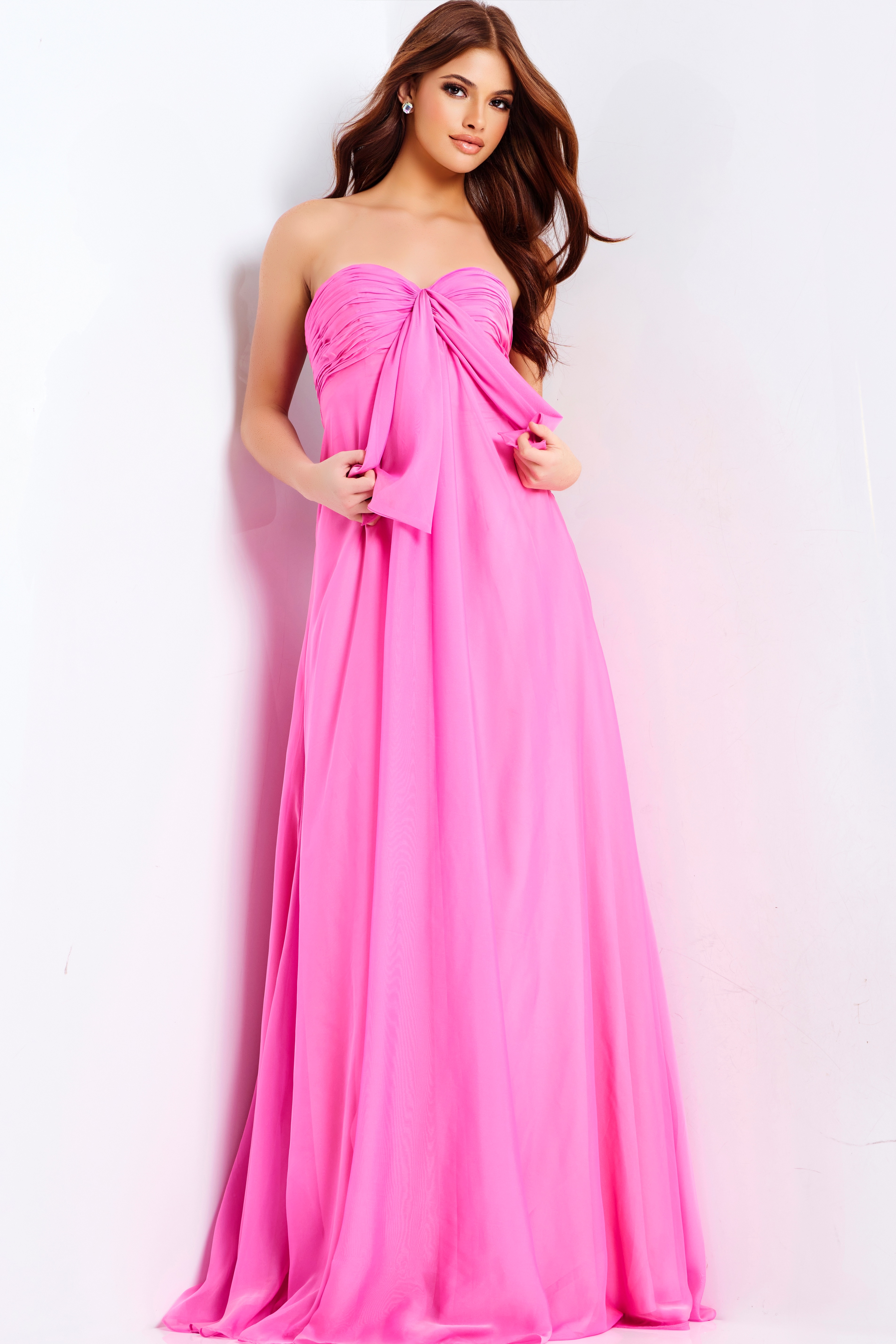 Elegant strapless pink prom gown with front drape and soft chiffon fabric