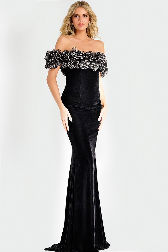 Off-shoulder velvet gown featuring ruffled beaded floral neckline and sleek floor-length silhouette.