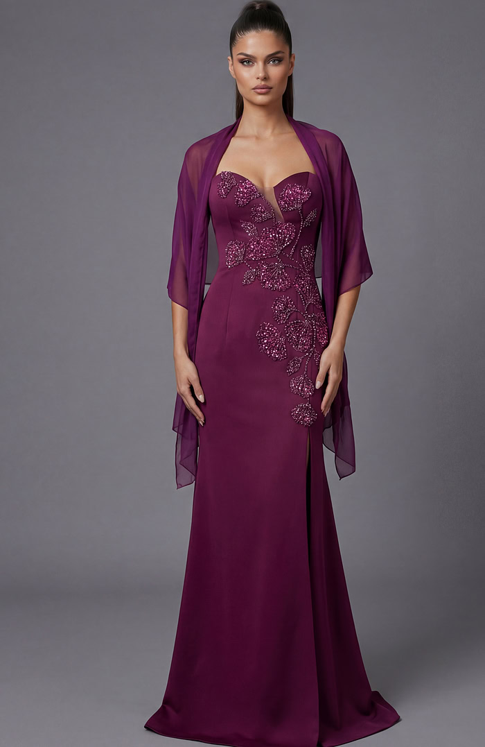 Front view of strapless evening gown with detailed beadwork and long skirt