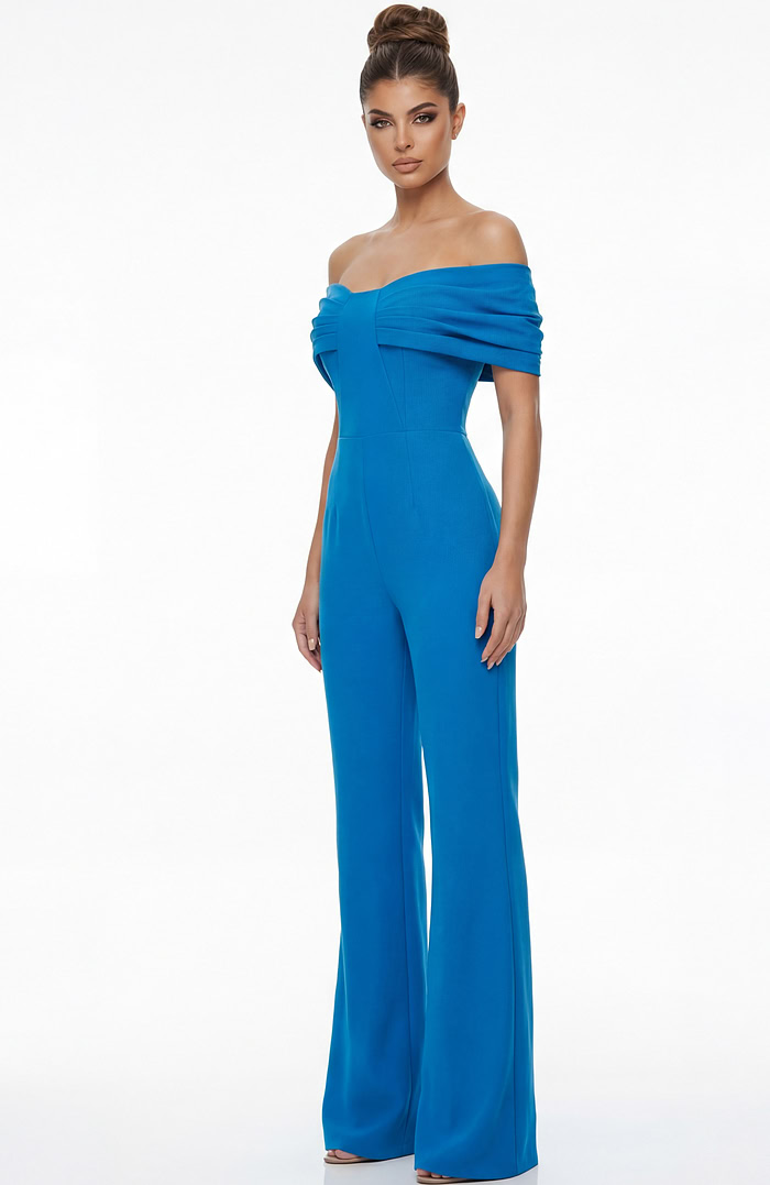 Front view of off shoulder tailored jumpsuit with pleated bodice and flowing wide leg silhouette