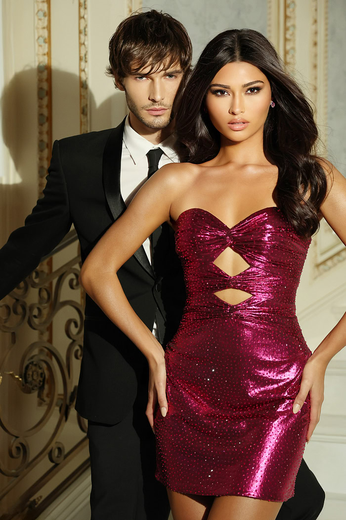 Model wearing strapless metallic mini dress with ruched back