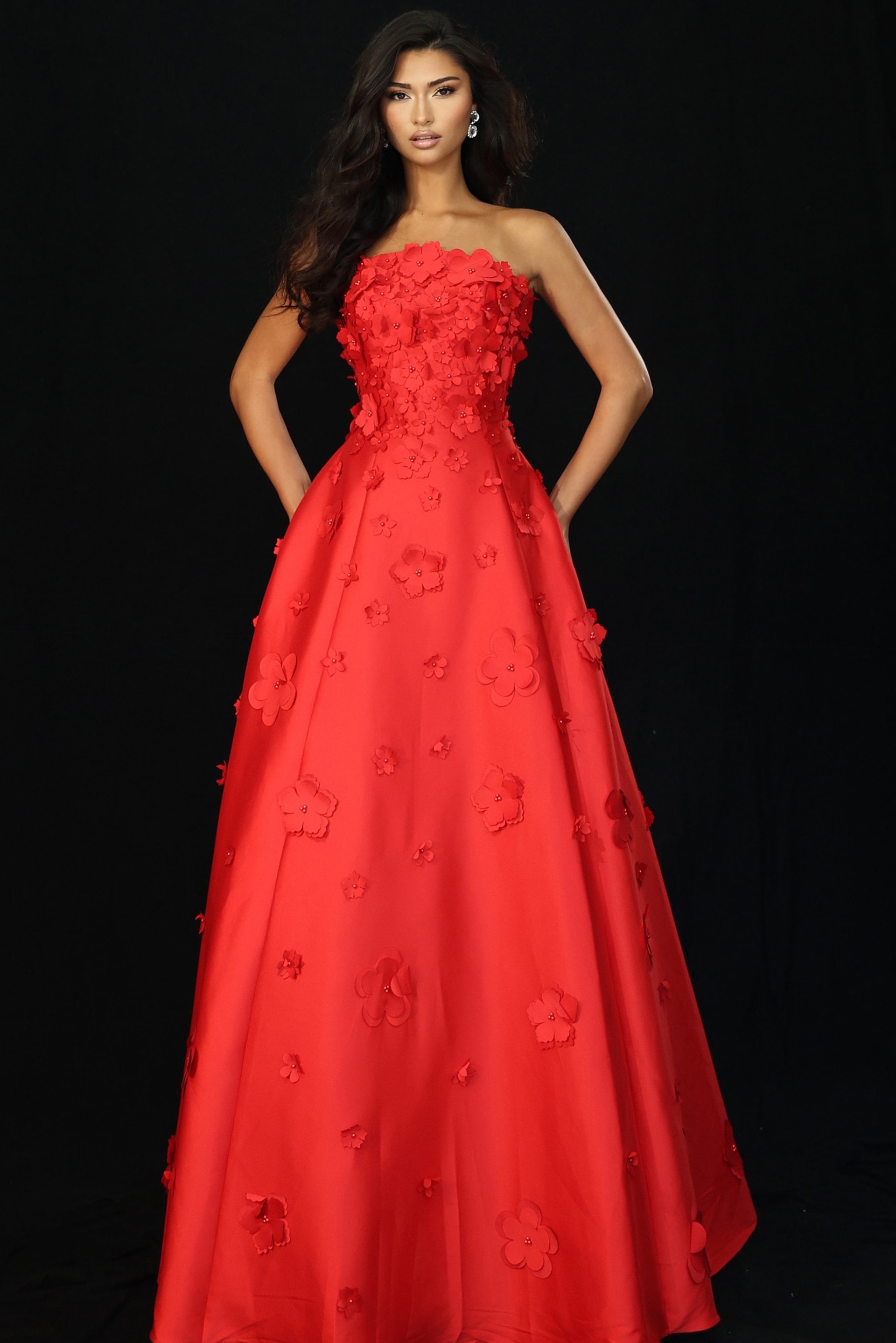 Strapless red ball gown with 3D floral appliqués and full satin skirt