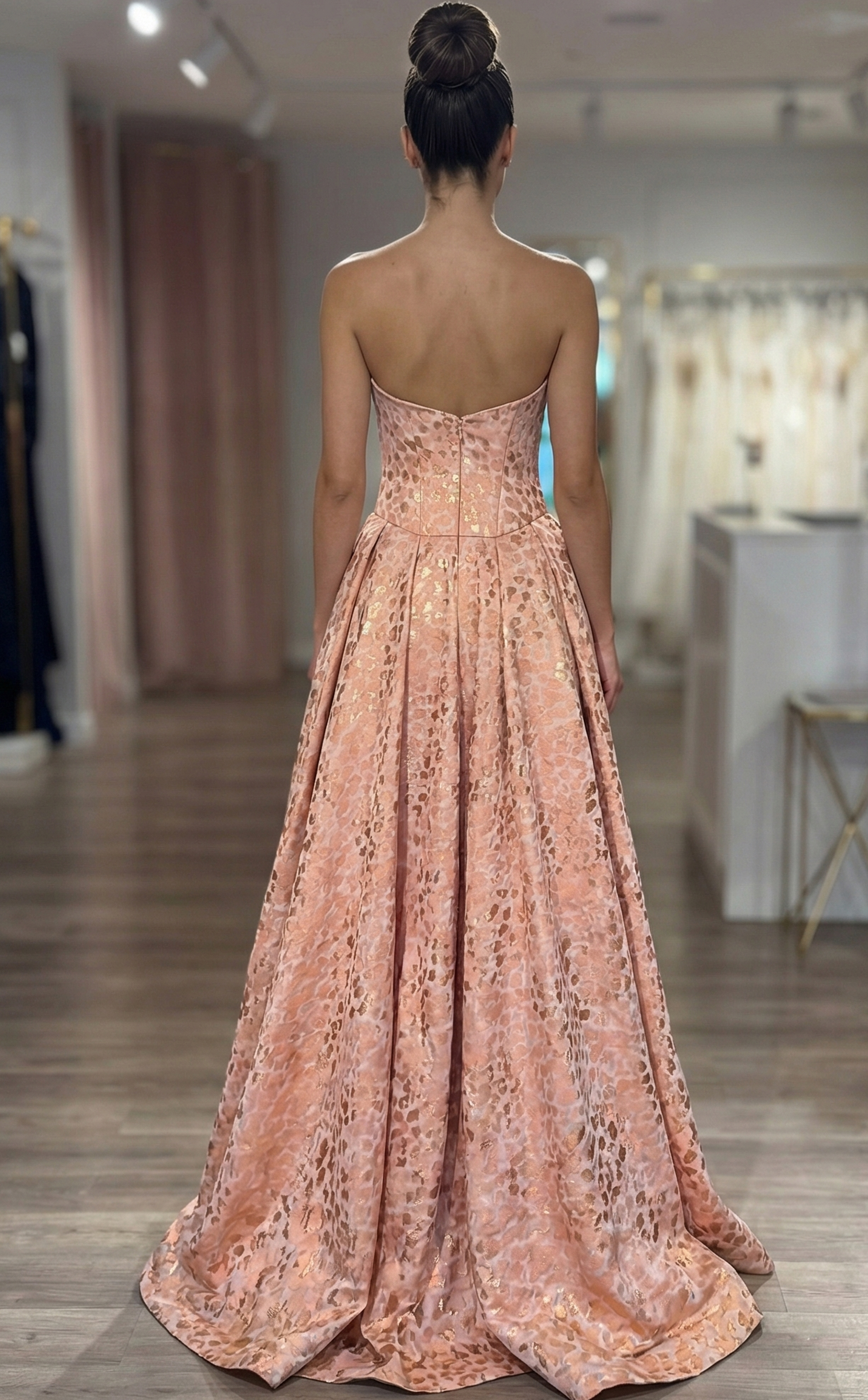 strapless formal gown highlighting structured bodice and flowing skirt volume