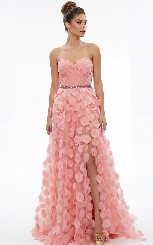 Front view of strapless gown with sweetheart neckline, gathered bodice, and textured appliqué skirt with front slit