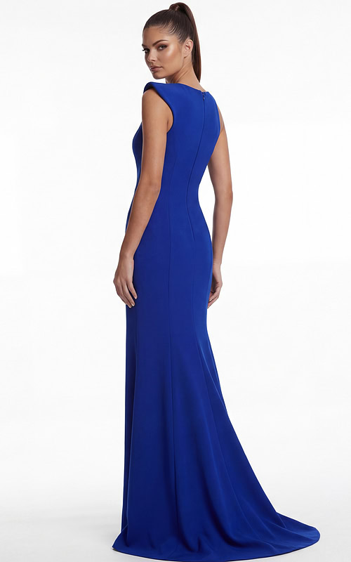 Back view of a fitted gown with clean lines and flowing floor length finish