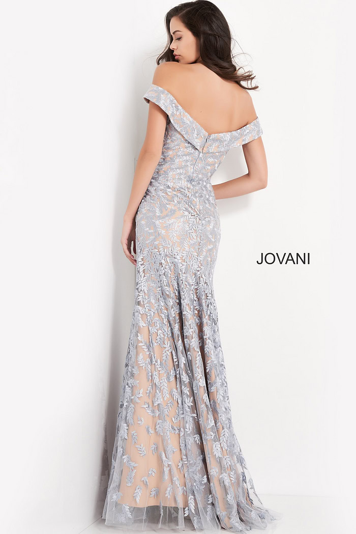 Model wearing Jovani 49634 light blue lace dress, back view.