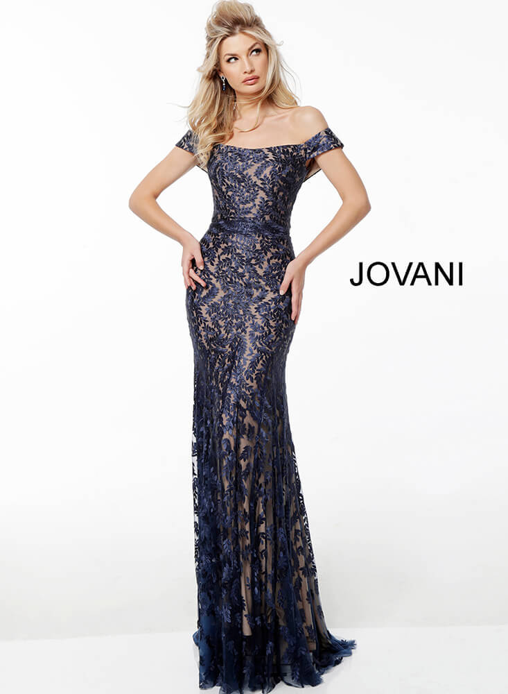 model wearing Jovani 49634 in navy showcasing front view with lace appliqué