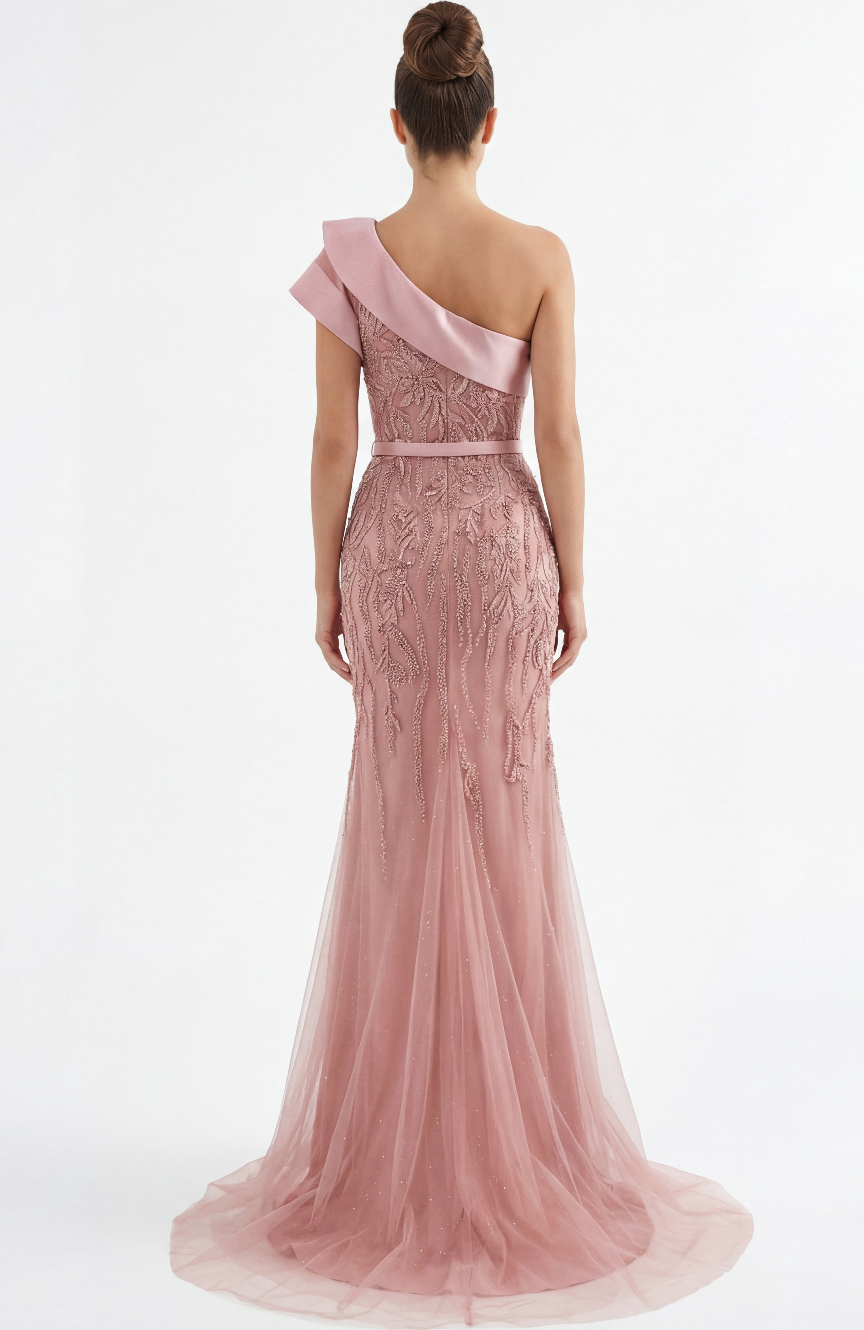Back view of one shoulder beaded evening gown with sheer tulle train