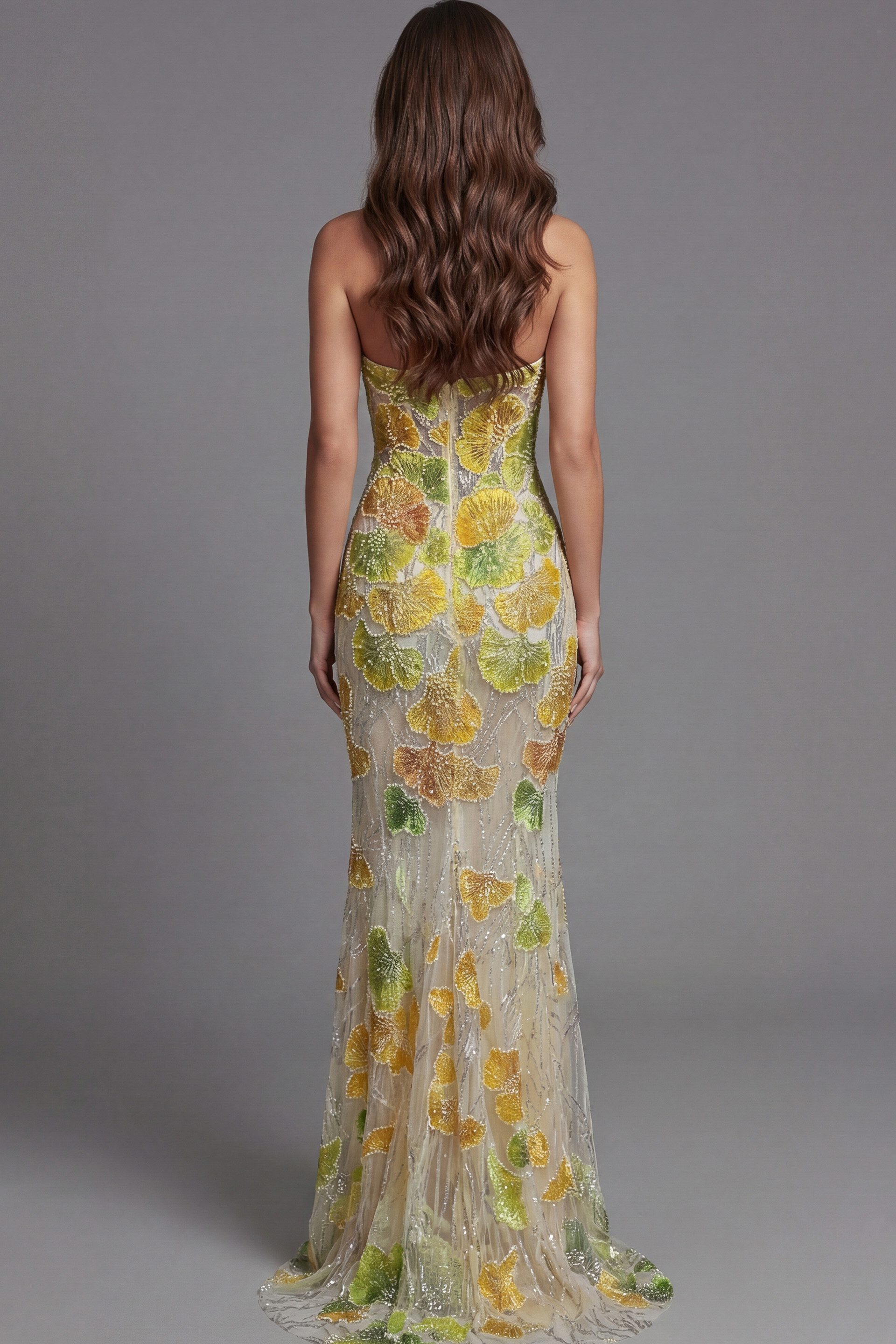 Strapless mermaid gown with yellow and green floral embellishments