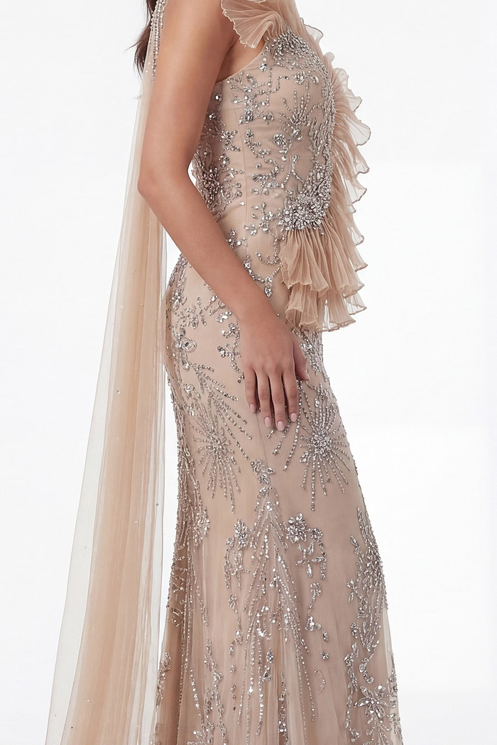 Nude mermaid gown with intricate crystal embellishments