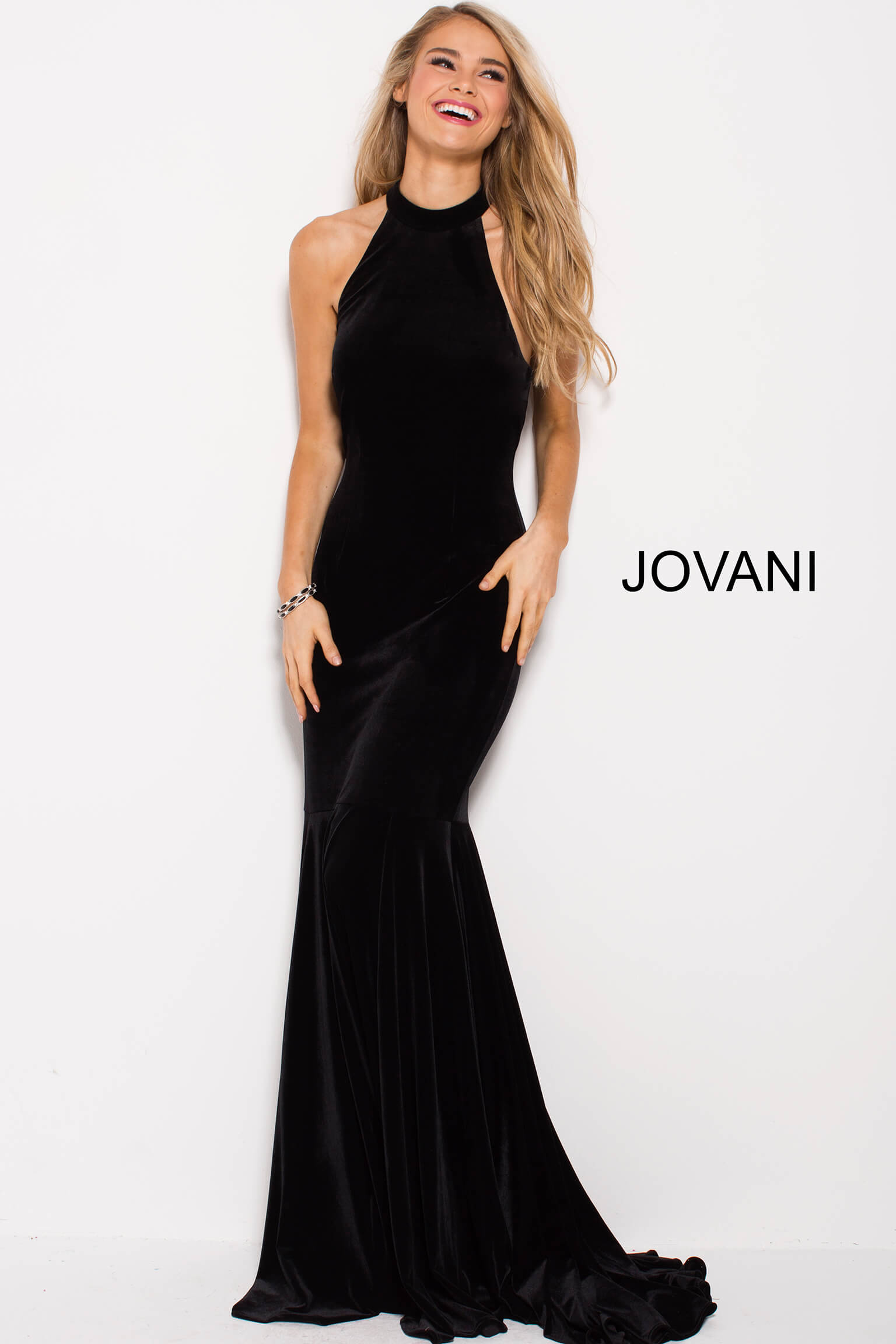 model wearing Jovani 51680 black velvet mermaid gown front view