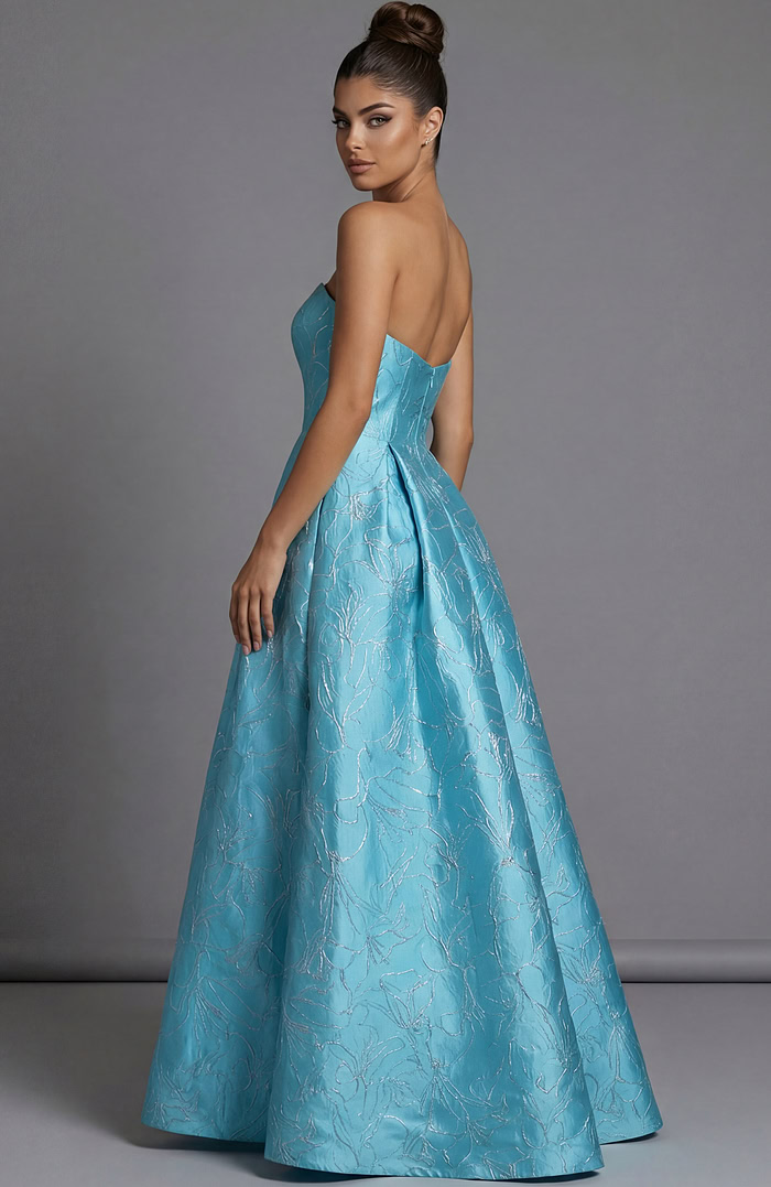 Strapless high low brocade dress with structured bodice and flowing back skirt