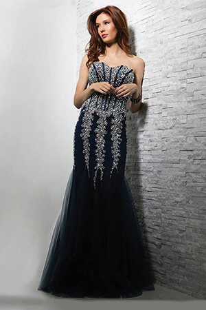 Model wearing Jovani 5908 navy dress with mermaid silhouette.