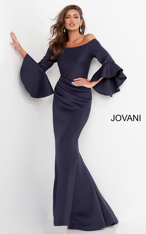 Model wearing Jovani 59993 Navy gown with off-the-shoulder neckline and voluminous sleeves.