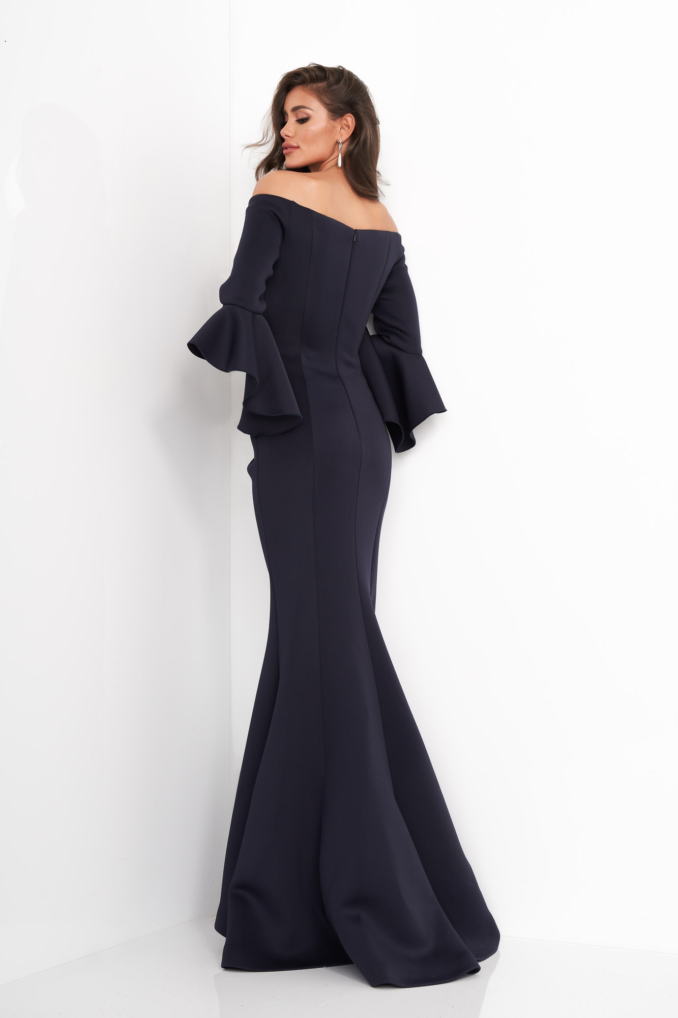 Back view of Jovani 59993 Navy gown, highlighting off-shoulder design.