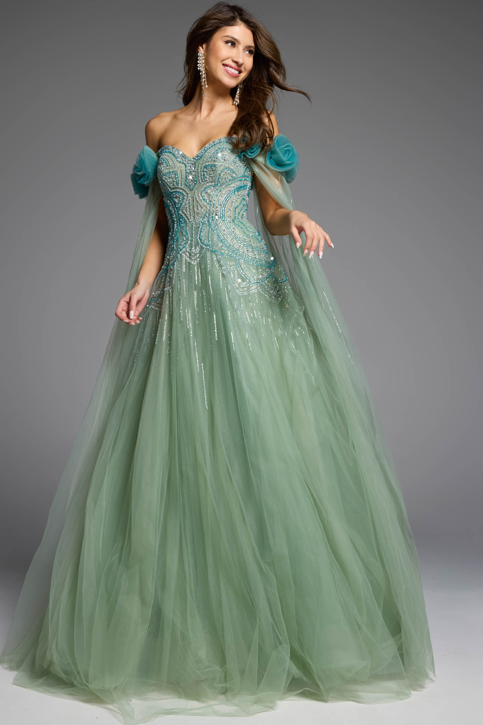 Elegant strapless green ball gown with floral embellishments