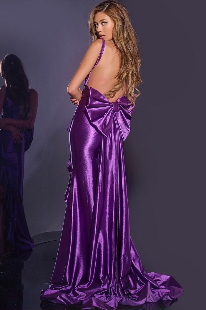Back view of Jovani D5305 purple gown with open back and large bow.