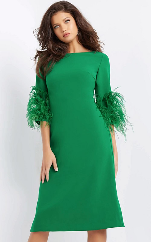 Model wearing Jovani 07341 green midi dress with feather-trimmed sleeves, front view.