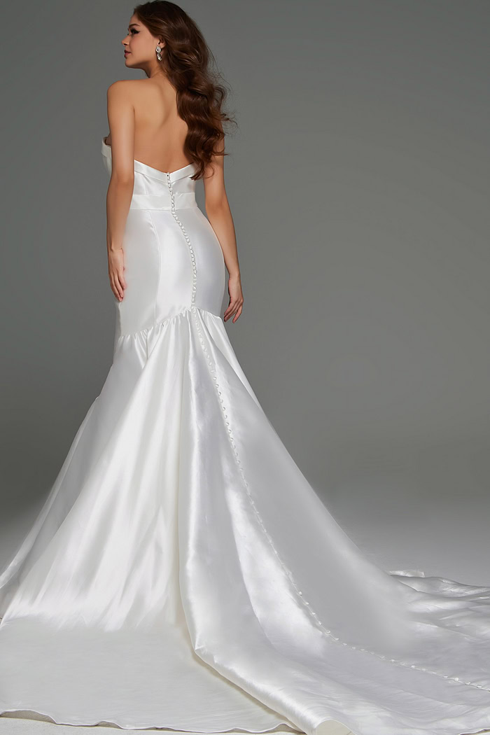 Model wearing JB05356 white mermaid dress, back view highlighting the button detailing and train.
