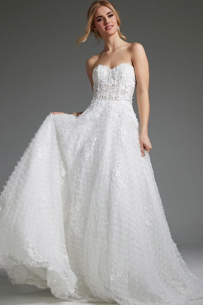 Model wearing Jovani JB07165 white gown with floral appliqué and sweetheart neckline, front view.