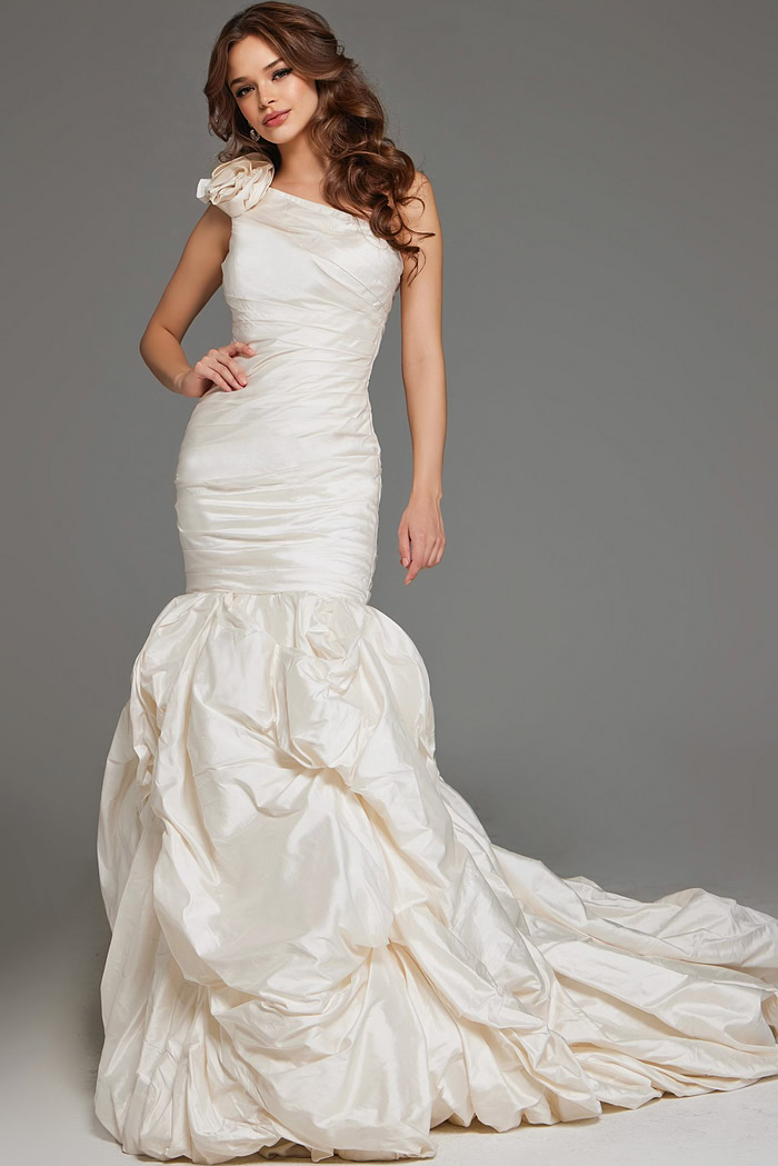 Model wearing Jovani 07179 white gown with one-shoulder neckline and mermaid silhouette, front view.