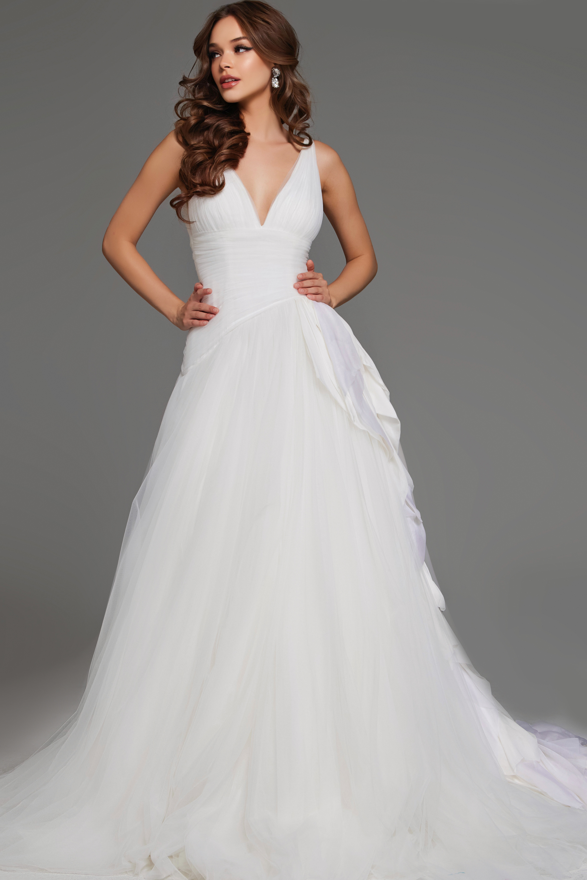 Model showcasing Jovani JB23241 front view of white A-line dress with elegant details.