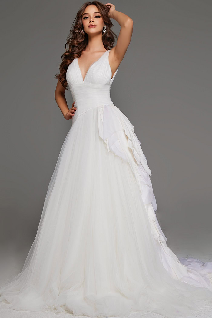 Model wearing Jovani JB23241 white A-line gown with deep V-neck and cascading ruffles.