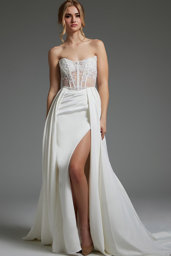 Model wearing Jovani JB37128 ivory dress with sweetheart neckline and high slit.