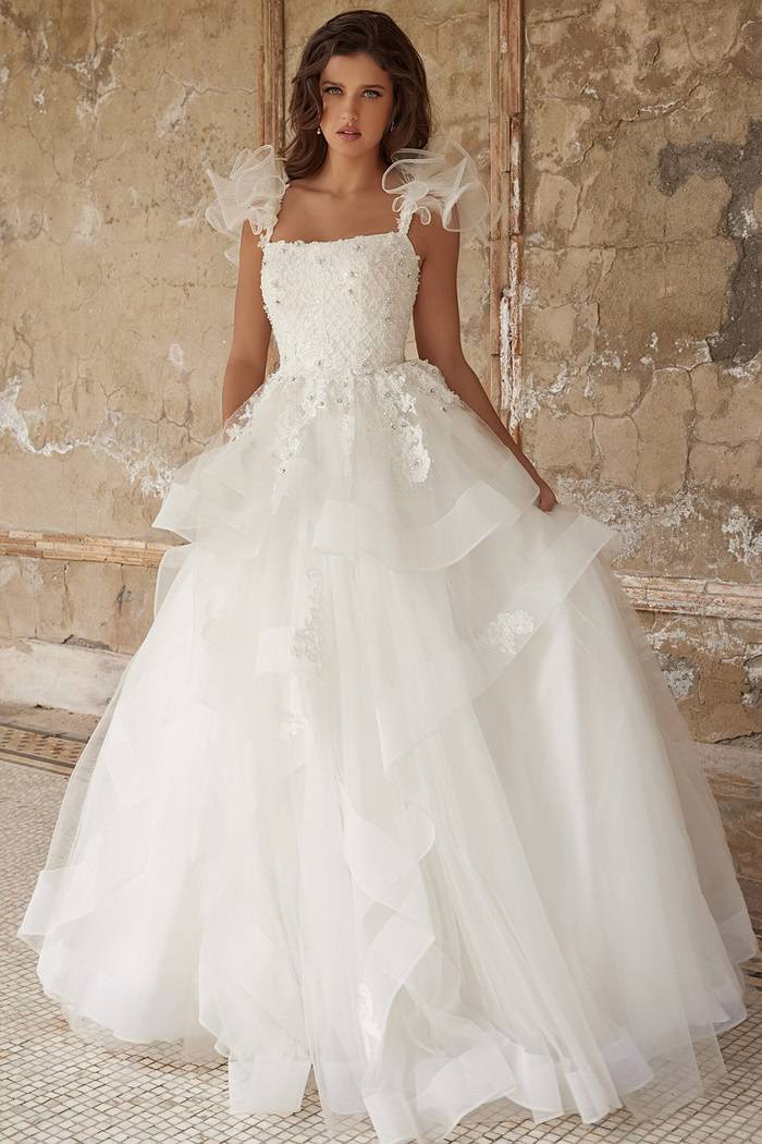 Flowing skirt of JB37575 white ball gown