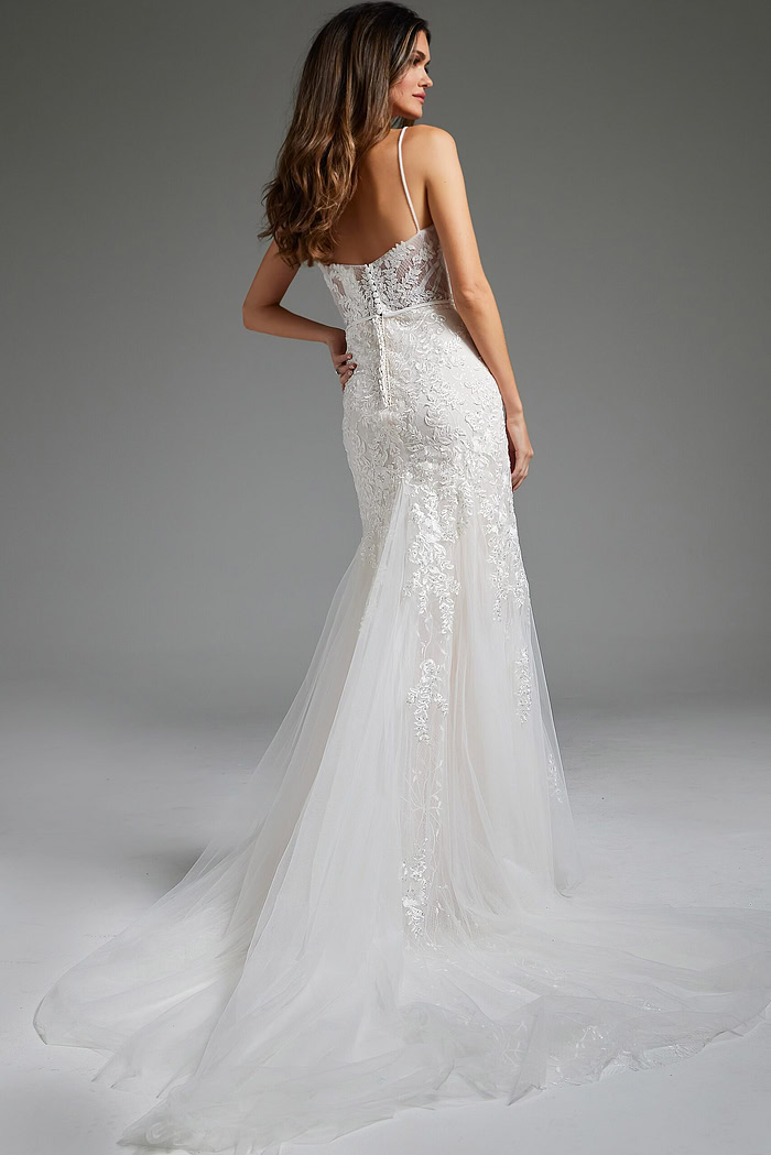 Model wearing Jovani JB38490, back view, showing delicate lace and train detail.
