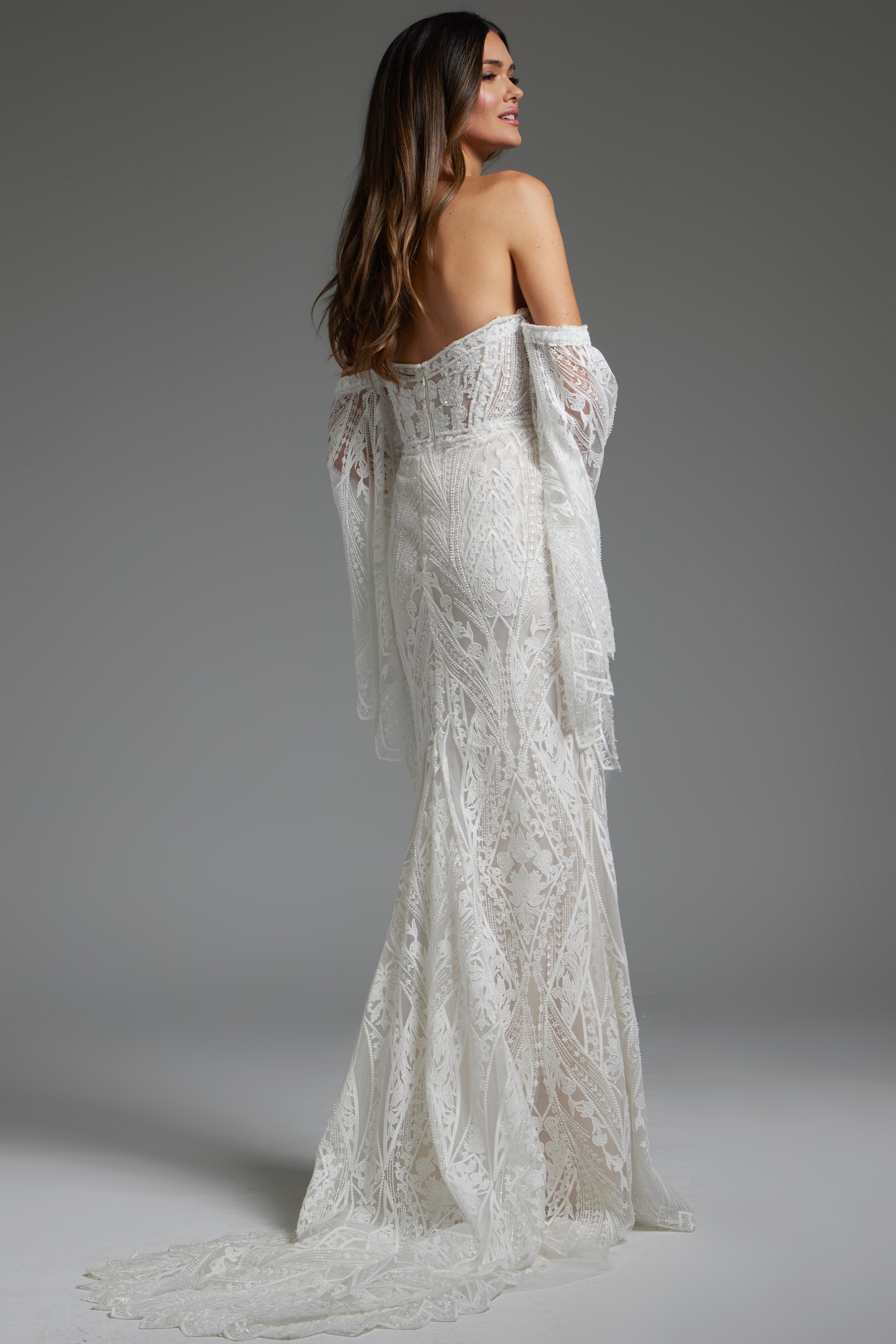model in Jovani jb39162 gown displaying back with lace details