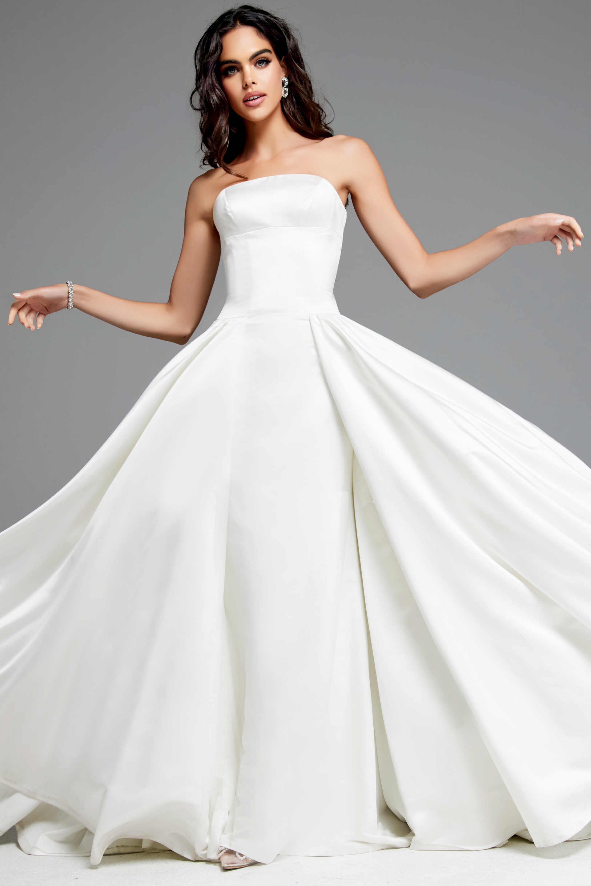 Model wearing Jovani JB39250 white gown, front view showing the dress