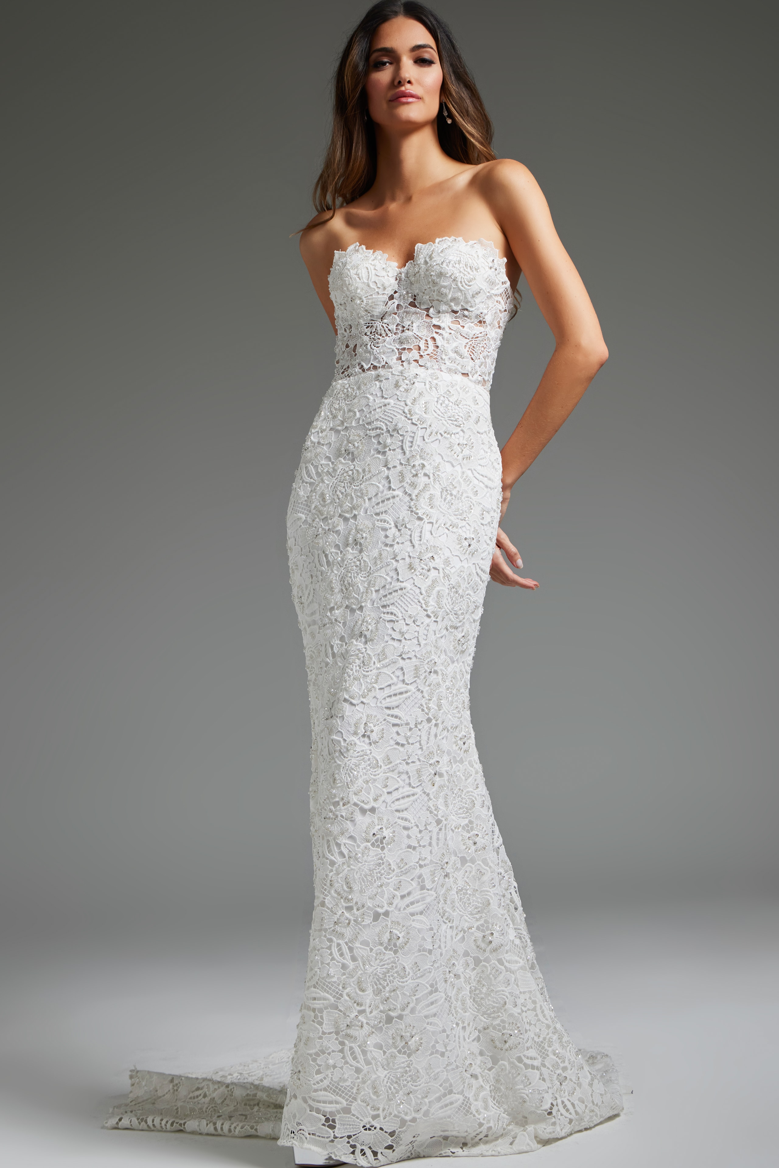 Model in Jovani JB39733 lace gown, front view showing strapless neckline and silhouette.