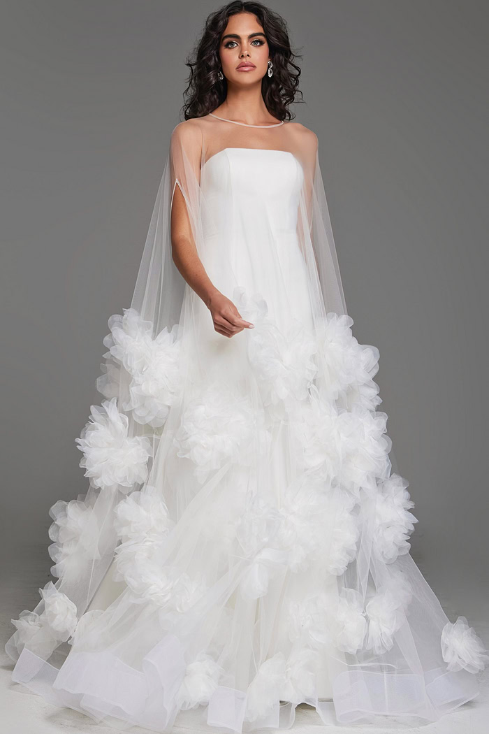 Model showcasing Jovani JB40091 white dress with flowery details in front.