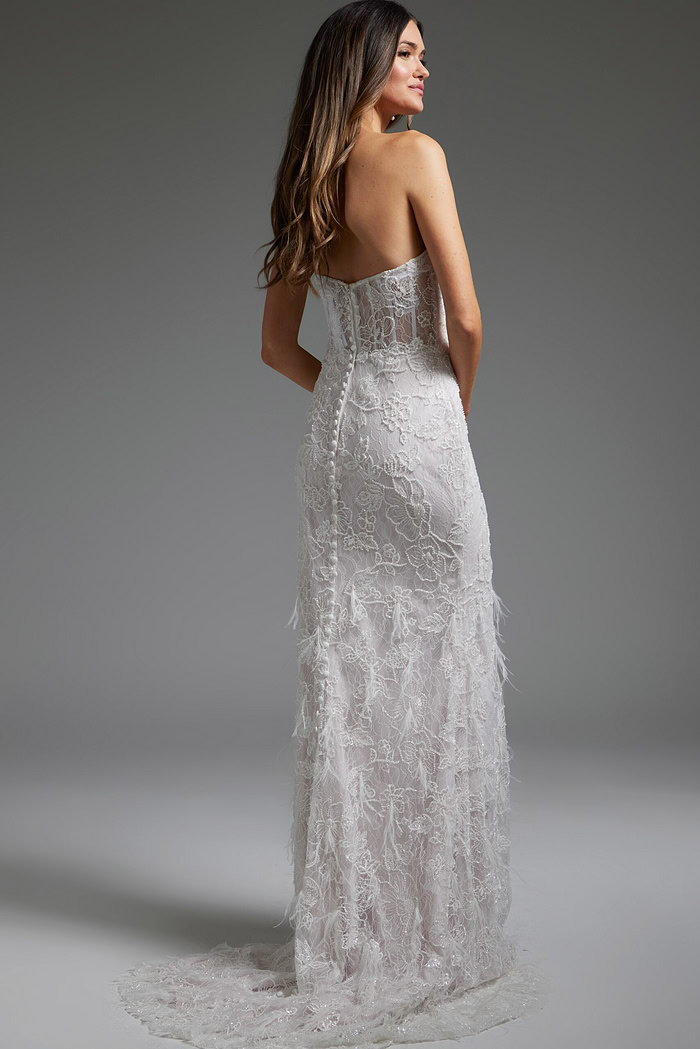 model wearing Jovani JB40590 back view white lace gown with low scoop
