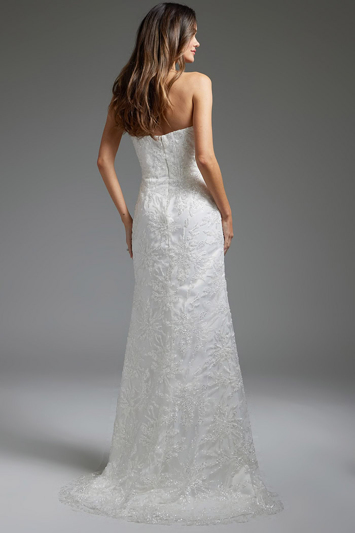 Model wearing JB40608 white gown, back view highlighting the streamlined fit and lace detailing