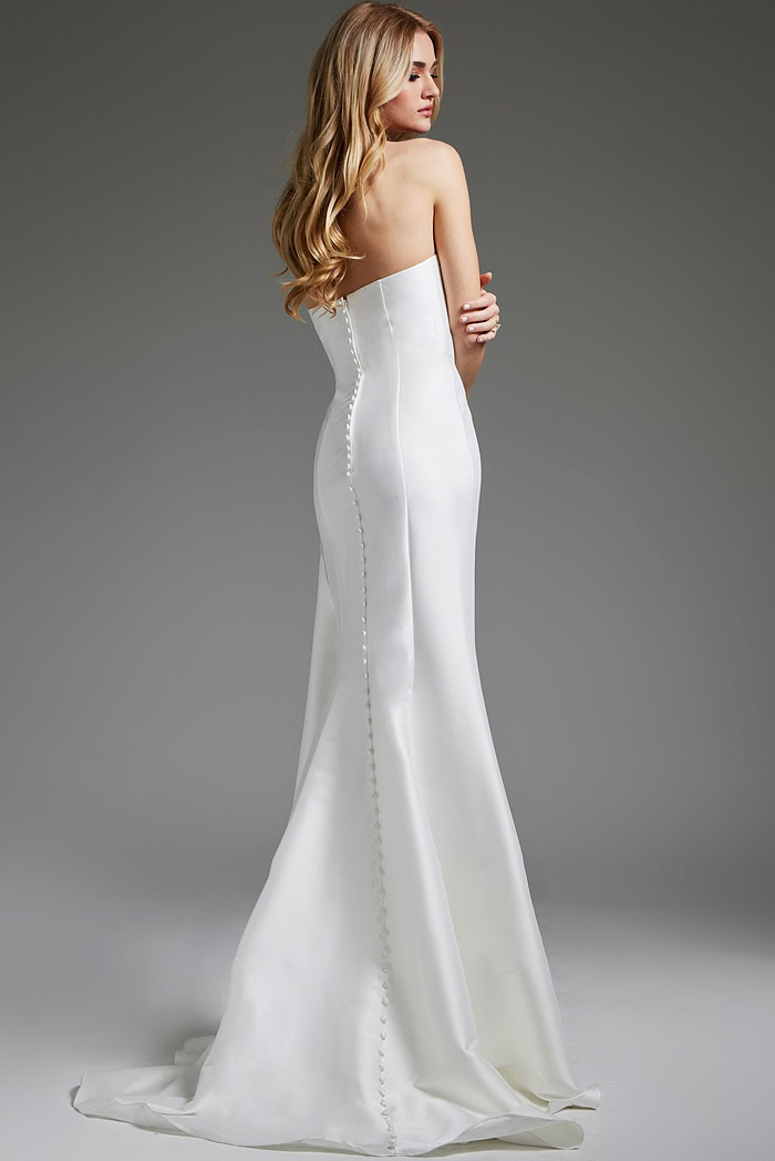 Model showing back of Jovani JB40791 white gown with long train.